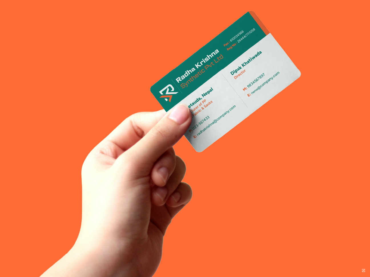 Radha Krishna Synthetic business card design mockup held in hand, teal and orange branding by ZakDesignz