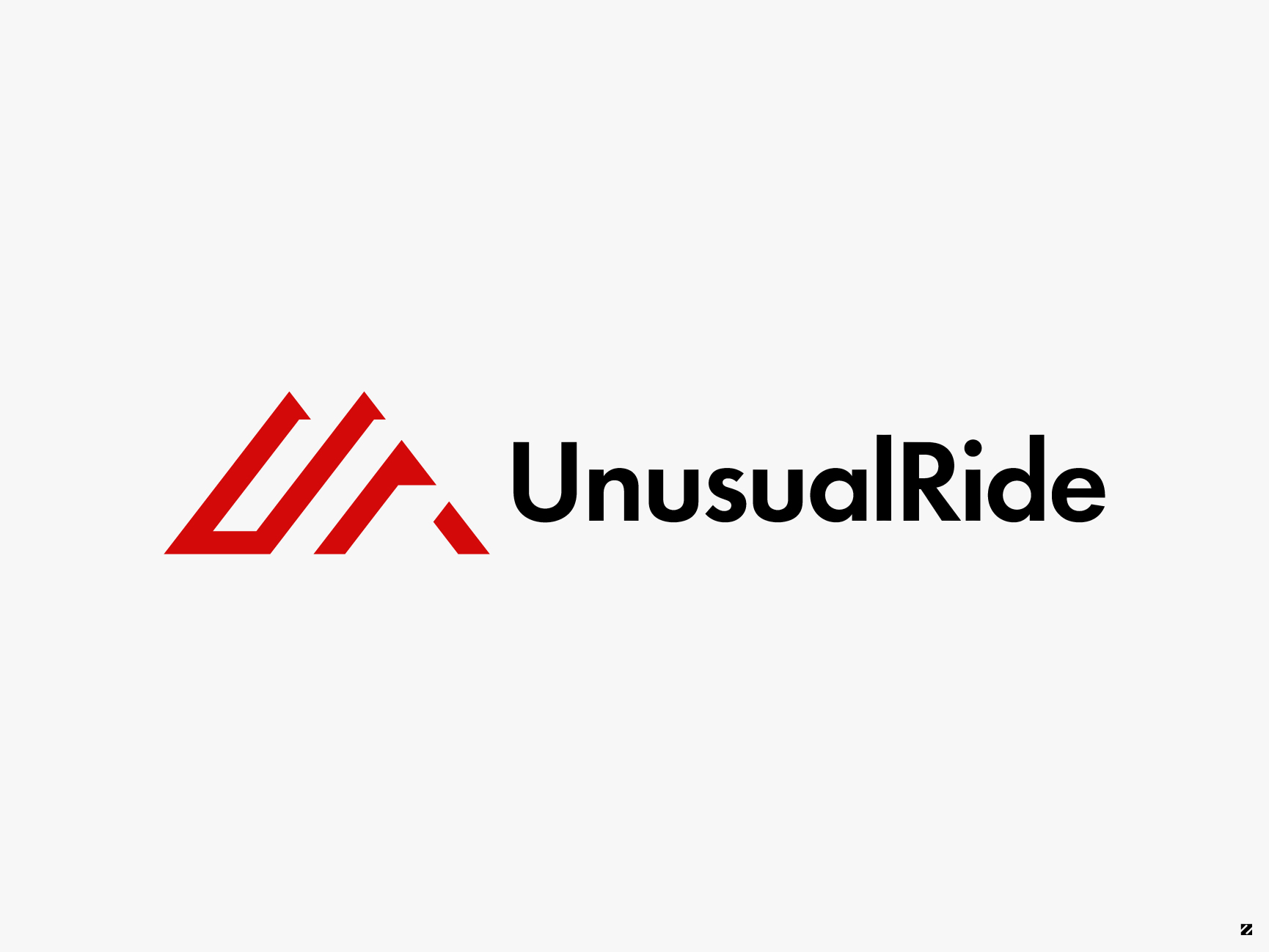 UnusualRide logo design featuring a red mountain-peak monogram mark
